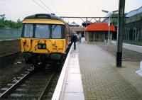 Westbound 303064 at Bellgrove.<br><br>[Ewan Crawford //1987]