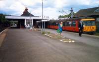 Neilston train at Muirend. Lovely station building and good shed.<br><br>[Ewan Crawford //1987]