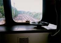 The great thing about the blue trains was being able to see out behind the driver. Knightswood North Junction - even before being turned into a single lead it did not favour eastbound trains to Cowlairs.<br><br>[Ewan Crawford //1987]