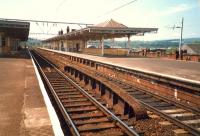 Dumbarton Central looking west. Elegant canopies. The slow eastbound platform was still in use.<br><br>[Ewan Crawford //1987]