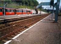 Dalmuir. Train sitting in the platform built for the Argyll Line (Glasgow Central Low Level) re-opening.<br><br>[Ewan Crawford //1987]