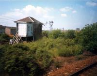 The back of the Westerton signalbox viewed from a train coming off the Milngavie line. The junction is now called Westerton Junction and the line single track at this point.<br><br>[Ewan Crawford //1987]