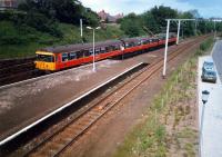 Leaving for Glasgow. The trackbed leading the the goods yard (right) has been landscaped.<br><br>[Ewan Crawford //1987]