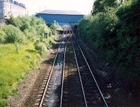 Strathbungo station site looking to Muirhouse South Junction. The booking office still stands - on the bridge ready for quadrupling of the line which never happened.<br><br>[Ewan Crawford //1987]