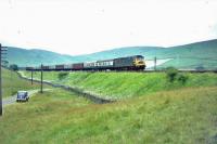 D1956 south of Abington with colourful train from Liverpool.<br><br>[John Robin 29/07/1967]