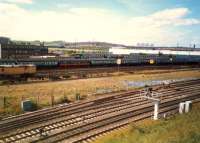 Turkey Yard looking west. Top to bottom; E&G (out of sight), Cowlairs Carriage Depot, Turkey Yard, Sighthill Branch, CGU.<br><br>[Ewan Crawford //1987]