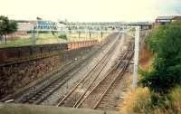 View north over Whifflet South Junction in 1987. Caley line on left, NB line on right. The RB Tennent Ltd Whifflet Foundry in the right background was still open at this time.<br><br>[Ewan Crawford //1987]