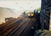 A westbound service approaching High Street station in 1987 passes Bridgeton Central Junction. [See image 50240]<br><br>[Ewan Crawford //1987]