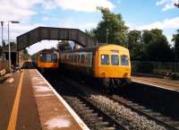 DMUs passing at Lenzie.<br><br>[Ewan Crawford //1987]