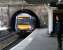 A westbound Edinburgh - Glasgow shuttle leaving Haymarket Tunnel and arriving at platform 4 in April 2006. Haymarket platform 4 is Scotland's busiest mainline railway platform. <br><br>[John Furnevel 04/04/2006]