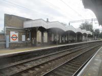 <h4><a href='/locations/B/Bruce_Grove'>Bruce Grove</a></h4><p><small><a href='/companies/B/Bethnal_Green_to_Edmonton_and_Lea_Valley_Line_Great_Eastern_Railway'>Bethnal Green to Edmonton and Lea Valley Line (Great Eastern Railway)</a></small></p><p>Bruce Grove station in the Tottenham area of north London, on the Liverpool Street to Enfield Town and Cheshunt line, part of London Overground since 31st May 2015, looking south on 31st August 2019. The station opened on 22nd July 1872 with the extension of the line from Stoke Newington to Lower Edmonton (now Edmonton Green).  The waiting rooms here are boarded-up and obsolete. 81/189</p><p>31/08/2019<br><small><a href='/contributors/David_Bosher'>David Bosher</a></small></p>