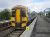 <h4><a href='/locations/R/Rogart'>Rogart</a></h4><p><small><a href='/companies/S/Sutherland_Railway'>Sutherland Railway</a></small></p><p>The first train of the day from Inverness to Wick via Thurso, in the hands of 158720, arriving at Rogart station, dead on time at 09.06 on 17th June 2019.   I'm used to hailing buses in London but this was the first time I'd ever hailed a train, Rogart being a request stop.  We then went to Thurso for lunch before going on to Wick for afternoon tea and back to Alness for an overnight stop in an excellent b & b.   Note too the mounting block to assist passengers to and from the very low platform. 6/20</p><p>17/06/2019<br><small><a href='/contributors/David_Bosher'>David Bosher</a></small></p>