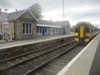 <h4><a href='/locations/T/Tain'>Tain</a></h4><p><small><a href='/companies/I/Inverness_and_Ross-shire_Railway'>Inverness and Ross-shire Railway</a></small></p><p>158717 with the ex-16.00 service from Wick via Thurso to Inverness calling at Tain station on 17th June 2019. My friend Paul and I were bound to our one night's b & b at Alness and this train did not stop there so we had to change here at Tain and await a stopping train to Inverness which started from the next station north at Ardgay. 37/43</p><p>17/06/2019<br><small><a href='/contributors/David_Bosher'>David Bosher</a></small></p>