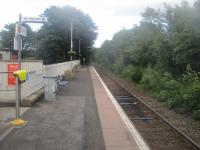 <h4><a href='/locations/A/Alness'>Alness</a></h4><p><small><a href='/companies/I/Inverness_and_Ross-shire_Railway'>Inverness and Ross-shire Railway</a></small></p><p>The single platform Alness station, on the Far North of Scotland line, looking north on the evening of 17th June 2019. This was one of several stations on the line that closed on 13th June 1960 (along with the branch from The Mound to Dornoch), an attempt at closure by stealth of the entire line although Rogart, also closed at that time, reopened very quickly on 6th March 1961. After the line was saved (and quite rightly, too) several other closed stations were later reopened and Alness came back from the dead on 7th May 1973. It is just a basic platform with, inevitably, a ubiquitous bus stop style waiting shelter but better that than no station at all for this very pleasant Highlands town. 16/20</p><p>17/06/2019<br><small><a href='/contributors/David_Bosher'>David Bosher</a></small></p>