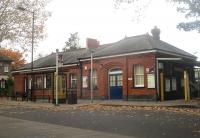 <h4><a href='/locations/G/Grange_Park'>Grange Park</a></h4><p><small><a href='/companies/E/Enfield_Branch_Great_Northern_Railway'>Enfield Branch (Great Northern Railway)</a></small></p><p>Grange Park station on the GNR Hertford North Loop, now in commercial use, on 30th October 2019. The station is still open and passengers enter and exit through the gate on the right. Although situated on the original 1871 section of the GNR's Enfield branch, the station did not open until 1910 when the line was extended from Enfield to Cuffley during the first stage of its incorporation into the Hertford North Loop. To avoid a level crossing at Enfield, the extension began just to the south and to the east of the tracks leading to the 1871 terminus to enable the new line to gain height and cross Windmill Hill by bridge with a new station at Enfield (later Enfield Chase).   Grange Park station was opened at the same time. The site of the 1871 station at Enfield became a goods yard and carriage sidings which survived for many years but all were swept away in the 1970s and a vast housing estate now covers the entire site,<br>See <a target=query href=/queries/closed.html>query 2186</a> 94/189</p><p>30/10/2019<br><small><a href='/contributors/David_Bosher'>David Bosher</a></small></p>