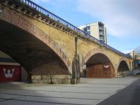 <h4><a href='/locations/L/Limehouse'>Limehouse</a></h4><p><small><a href='/companies/B/Blackwall_Railway'>Blackwall Railway</a></small></p><p>Limehouse Viaduct, east London, from the south-east on 15th February 2014. This viaduct opened in 1840 for the London & Blackwall Railway and closed to passengers in 1926 and to freight in 1962. It then stood unused until utilised by the first stage of the Docklands Light Railway (Tower Gateway to Island Gardens section) in 1985. The viaduct is now a Grade 1 Listed Structure by English Heritage. 3/46</p><p>15/02/2014<br><small><a href='/contributors/David_Bosher'>David Bosher</a></small></p>