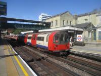 <h4><a href='/locations/F/Finchley_Central'>Finchley Central</a></h4><p><small><a href='/companies/E/Edgware,_Highgate_and_London_Railway'>Edgware, Highgate and London Railway</a></small></p><p>LUL 1995 stock on a Northern Line service to Kennington (via Charing Cross) arriving at Finchley Central station, on the glorious afternoon of Saturday, 14th September 2019. This station was opened as part of the Edgware, Highgate & London Railway on 22nd July 1867 as Finchley & Hendon and renamed Finchley (Church End) sometime in 1870. It became Finchley Central on 1st April 1940 when Northern Line tube trains were extended over newly-electrified ex-LNER tracks to High Barnet. 36/87</p><p>14/09/2019<br><small><a href='/contributors/David_Bosher'>David Bosher</a></small></p>