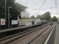 <h4><a href='/locations/B/Brondesbury'>Brondesbury</a></h4><p><small><a href='/companies/H/Hampstead_Junction_Railway_London_and_North_Western_Railway'>Hampstead Junction Railway (London and North Western Railway)</a></small></p><p>If the entrance to Brondesbury station is uninspiring, the platforms are even less so, as seen in this view looking east on 5th October 2019. This is one of the original stations of the Hampstead Junction Railway, opened with the line on 2nd January 1860 and it went through several name changes in its first 23 years.  Edgware Road (Kilburn) on opening became simply Edgware Road on 1st October 1865. In 1872, it was further renamed Edgware Road & Brondesbury but still this did not satisfy the LNWR Directors and in 1873 it became Brondesbury (Edgware Road). Edgware Road was finally dropped altogether when, on 1st May 1883, it became simply Brondesbury and has remained so to the present day. This was once part of the Broad Street to Richmond Line, infamously listed for closure in the 1963 Beeching Report but was eventually saved and since becoming part of London Overground in 2007, it now carries far more passengers than it ever did. 90/189</p><p>05/10/2019<br><small><a href='/contributors/David_Bosher'>David Bosher</a></small></p>