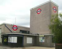 <h4><a href='/locations/W/Wanstead'>Wanstead</a></h4><p><small><a href='/companies/C/Central_Line_Extension_London_Passenger_Transport_Board'>Central Line Extension (London Passenger Transport Board)</a></small></p><p>The rather plain exterior of Wanstead station, opened on 14th December 1947 with the Central Line extension from Leytonstone to Newbury Park, on 27th July 2014.  The tunnels on this extension were complete before the start of World War Two and were converted into an underground factory for the manufacturing of aircraft components by the Plessey Company throughout the duration of the war. 25/138</p><p>27/07/2014<br><small><a href='/contributors/David_Bosher'>David Bosher</a></small></p>