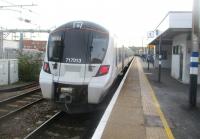 <h4><a href='/locations/H/Hornsey'>Hornsey</a></h4><p><small><a href='/companies/L/London_to_Peterborough_Great_Northern_Railway'>London to Peterborough (Great Northern Railway)</a></small></p><p>717013 from Watton-at-Stone in Hertfordshire to Moorgate heading away from the camera as it departs from Hornsey station in north London, on 30th October 2019. This was one of the original GNR stations of 1850, irreparably damaged when rebuilt by BR in 1976 for the electrification of the London suburban services. This saw the platforms on the main line ECML tracks abolished, leaving only one side of both island platforms for local trains. The shoddy buildings date from the same time while the replacement ticket office, inconveniently sited on a bridge linking both sides of the line and which involves lots of steps (and badly lit at night too), resembles more a public convenience than a railway station. 5/13</p><p>30/10/2019<br><small><a href='/contributors/David_Bosher'>David Bosher</a></small></p>