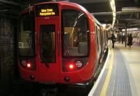 <h4><a href='/locations/B/Baker_Street_Met'>Baker Street [Met]</a></h4><p><small><a href='/companies/M/Metropolitan_Railway'>Metropolitan Railway</a></small></p><p>LUL S8 stock with a Metropolitan Line service terminating in the west side bay platform at Baker Street station, on 28th November 2012. The original platforms on the world's first Underground, the Metropolitan Railway, opened in 1863 but this side of the station, on the north, was added in 1868 with the first stage of the Metropolitan Extension Railway and which diverges from the original line just to the east of the 1863 platforms. The extension station has two through platforms for trains to and from Aldgate plus two bays for short workings, this one on the west side and the other on the east. 1/21</p><p>28/11/2012<br><small><a href='/contributors/David_Bosher'>David Bosher</a></small></p>