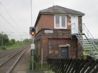<h4><a href='/locations/A/Alnmouth'>Alnmouth</a></h4><p><small><a href='/companies/N/Newcastle_and_Berwick_Railway'>Newcastle and Berwick Railway</a></small></p><p>Alnmouth signal box, at the north end of the up platform on the evening of 17th June 2018. The branch trains to the historic market town of Alnwick, withdrawn in September 1968, left from a bay platform on the far side of the down platform and went off through where fully-grown trees and bushes now stand in the left background. A short section of this is now the heritage Aln Valley Railway. 12/23</p><p>17/06/2018<br><small><a href='/contributors/David_Bosher'>David Bosher</a></small></p>