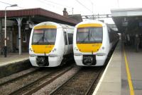 <h4><a href='/locations/U/Upminster'>Upminster</a></h4><p><small><a href='/companies/B/Barking,_Upminster_and_Pitsea_Line_London,_Tilbury_and_Southend_Railway'>Barking, Upminster and Pitsea Line (London, Tilbury and Southend Railway)</a></small></p><p>357216 to Fenchurch Street (left), and 357227 to Southend Central via Ockendon (right), at Upminster on 17th April 2013. This Essex station is also the eastern terminus of the District Line and of the short single-track branch from Romford that became a detached part of London Overground on 31st May 2015. 4/20</p><p>17/04/2013<br><small><a href='/contributors/David_Bosher'>David Bosher</a></small></p>