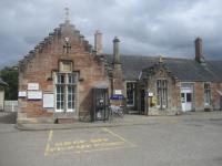 <h4><a href='/locations/D/Dingwall'>Dingwall</a></h4><p><small><a href='/companies/I/Inverness_and_Ross-shire_Railway'>Inverness and Ross-shire Railway</a></small></p><p>Exterior of Dingwall station, on the Highland Railway main line north of Inverness and the junction for the scenic Kyle of Lochalsh branch, on the afternoon of Tuesday, 18th June 2019.   This and the lines to Wick and Thurso were listed for closure in the infamous 1963 Beeching Report but were thankfully reprieved in 1965.    17/20</p><p>18/06/2019<br><small><a href='/contributors/David_Bosher'>David Bosher</a></small></p>