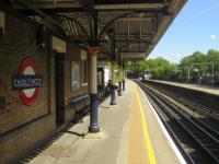 <h4><a href='/locations/C/Chorleywood'>Chorleywood</a></h4><p><small><a href='/companies/C/Chesham_Branch_Harrow_and_Rickmansworth_Railway'>Chesham Branch (Harrow and Rickmansworth Railway)</a></small></p><p>Chorleywood, owned by TfL and served by Metropolitan Line Amersham and Chesham trains and also National Rail Chiltern Trains services between Marylebone and Aylesbury Vale Parkway, looking towards London on a glorious 27th May 2013. Note the southbound Platform 2 sign that is still showing British Rail, 16 years after privatisation. 18/138</p><p>27/05/2013<br><small><a href='/contributors/David_Bosher'>David Bosher</a></small></p>