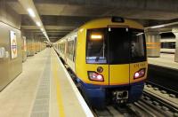 <h4><a href='/locations/D/Dalston_Junction'>Dalston Junction</a></h4><p><small><a href='/companies/N/North_London_Railway'>North London Railway</a></small></p><p>378153, in one of the two bay platforms at the new Dalston Junction station, on 11th December 2010, nine months after it opened. It is on the site of the original Dalston Junction that opened in 1865 with the North London Railway's City branch to its grand terminus at Broad Street but that line closed in 1986. I remember the old Dalston Junction, which was open to the sky, very well. It was redolent of decay with unrepaired war damage. All the old ravaged buildings were torn down by BR in the 1970s and replaced with, inevitably, ghastly bus stop style waiting shelters. Personally, I preferred the ruins. On the outside of the two bay platforms are the through platforms for trains from Highbury & Islington to Crystal Palace, West Croydon and Clapham Junction. All trains from New Cross, however, terminate at Dalston Junction. 1/58</p><p>11/12/2010<br><small><a href='/contributors/David_Bosher'>David Bosher</a></small></p>