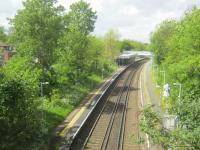 <h4><a href='/locations/B/Beckenham_Hill'>Beckenham Hill</a></h4><p><small><a href='/companies/S/Shortlands_and_Nunhead_Railway'>Shortlands and Nunhead Railway</a></small></p><p>Beckenham Hill, on the Catford Loop in south-east London, looking north on 10th May 2014. This line and station were latecomers to London's railway geography, not opening until 1st July 1892. This view is seen through the upstairs side windows of preserved RML 2760, the very last traditional Routemaster bus built for London Transport in 1968, returning from Elmers End to Catford Bus Garage during the latter's Open Day. 33/189</p><p>10/05/2014<br><small><a href='/contributors/David_Bosher'>David Bosher</a></small></p>