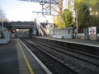 <h4><a href='/locations/C/Crouch_Hill'>Crouch Hill</a></h4><p><small><a href='/companies/T/Tottenham_and_Hampstead_Junction_Railway'>Tottenham and Hampstead Junction Railway</a></small></p><p>An almost deserted Crouch Hill station, apart from a friend of mine, also called David, inside the bus stop style waiting shelter, on the GOBLIN section of the London Overground looking towards Gospel Oak, on 1st December 2020, the last full day of the second national lockdown due to the coronavirus pandemic. 15/18</p><p>01/12/2020<br><small><a href='/contributors/David_Bosher'>David Bosher</a></small></p>