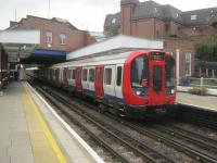 <h4><a href='/locations/N/Northwood_Hills'>Northwood Hills</a></h4><p><small><a href='/companies/M/Metropolitan_Railway'>Metropolitan Railway</a></small></p><p>LUL S8 stock train with a Metropolitan Line service to Baker Street arriving at Northwood Hills station, on 14th September 2013. 12/21</p><p>14/09/2013<br><small><a href='/contributors/David_Bosher'>David Bosher</a></small></p>