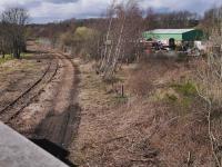 <h4><a href='/locations/K/Kirkland_Yard'>Kirkland Yard</a></h4><p><small><a href='/companies/K/Kirkland_Yard_and_Leven_Dock_to_Methil_Line_Widening_North_British_Railway'>Kirkland Yard and Leven Dock to Methil Line Widening (North British Railway)</a></small></p><p>Looking west to the former Kirkland Yard, with the Fife Heritage Railway's base on the right, showing the cleared trackbed in March 2021.<br><br> 12/43</p><p>26/03/2021<br><small><a href='/contributors/Bill_Roberton'>Bill Roberton</a></small></p>