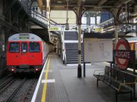 <h4><a href='/locations/A/Aldgate'>Aldgate</a></h4><p><small><a href='/companies/M/Metropolitan_Railway'>Metropolitan Railway</a></small></p><p>LU C stock (now withdrawn) on a clockwise Circle Line service departing from the atmospheric Aldgate station, opened in 1876, on 10th January 2013.  This was the 150th Anniversary of the opening of the World's First Underground line, the Metropolitan Railway from Bishops Road, Paddington to Farringdon Street (renamed Farringdon & High Holborn in 1922 and further renamed to simply Farringdon in 1936). 3/14</p><p>10/01/2013<br><small><a href='/contributors/David_Bosher'>David Bosher</a></small></p>