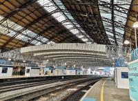 <h4><a href='/locations/B/Bristol_Temple_Meads'>Bristol Temple Meads</a></h4><p><small><a href='/companies/B/Bristol_and_Exeter_Railway'>Bristol and Exeter Railway</a></small></p><p>These graceful arched structures at Temple Meads are presumably something to do with roof renovation, but strike me as being more attractive than a lot of so-called works of modern art. View looks substantially East. 117/122</p><p>01/08/2021<br><small><a href='/contributors/Ken_Strachan'>Ken Strachan</a></small></p>