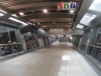<h4><a href='/locations/W/Whitechapel'>Whitechapel</a></h4><p><small><a href='/companies/E/East_London_Railway'>East London Railway</a></small></p><p>New walkway at Whitechapel, from a spacious new concourse to the Overground platforms, recently opened, looking north on 27th August 2021. The whole station had been marred by hoardings while the work was going on but these have now been removed, in readiness for when the station becomes an interchange with Crossrail (to be reached via escalators) that is now scheduled for spring 2022. With so many delays since the setback with the original opening date of December 2018, Londoners are not holding their breath. 82/138</p><p>27/08/2021<br><small><a href='/contributors/David_Bosher'>David Bosher</a></small></p>