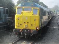 <h4><a href='/locations/N/North_Weald'>North Weald</a></h4><p><small><a href='/companies/O/Ongar_Extension_Great_Eastern_Railway'>Ongar Extension (Great Eastern Railway)</a></small></p><p>31438 on siding at North Weald, seen from passing DMU from Ongar to Epping Forest, on 5th September 2021. This locomotive, originally D5557, was built at Brush Works, Loughborough and entered service on 15th October 1959, initially working from Ipswich Loco Shed. As 31139, she was mothballed in 1981 before being selected to have Electric Train Heating fitted, which was completed on 23rd April 1984 and subsequently renumbered 31438 before moving to the EOR in October 2011. 22/25</p><p>05/09/2021<br><small><a href='/contributors/David_Bosher'>David Bosher</a></small></p>