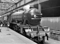 <h4><a href='/locations/E/Edinburgh_Waverley'>Edinburgh Waverley</a></h4><p><small><a href='/companies/N/North_British_Railway'>North British Railway</a></small></p><p>Plenty of young admirers for A3 4472 'Flying Scotsman' after arrival at Edinburgh Waverley with the 'Aberdonian' railtour of 25th June 1966. The tour had started at London Waterloo, and the A3 covered the Hellifield â€“ Edinburgh stage, using the Settle & Carlisle and Waverley routes.   32/132</p><p>25/06/1966<br><small><a href='/contributors/Robin_McGregor'>Robin McGregor</a></small></p>