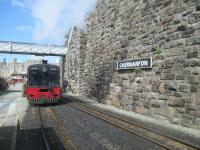 <h4><a href='/locations/C/Caernarfon'>Caernarfon</a></h4><p><small><a href='/companies/N/Nantlle_Railway'>Nantlle Railway</a></small></p><p>Ex-South African Railways NSGG Class 16 2-6-2+2-6-2 No.87, 79 years old at the date of this photo, running round at the northern terminus of the Welsh Highland Railway at Caernarfon on 22nd May 2016. This is on a new site on the trackbed of the former LNWR Afon Wen to Bangor line south of the original standard gauge station and, since this visit, reconstruction of the station began and a spacious new entrance building is now fully open.    The famous 13th Century Castle can be seen in the left background. 20/75</p><p>22/05/2016<br><small><a href='/contributors/David_Bosher'>David Bosher</a></small></p>