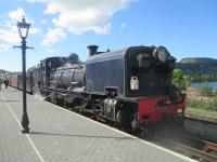 <h4><a href='/locations/P/Porthmadog_Harbour_WHR'>Porthmadog Harbour [WHR]</a></h4><p><small><a href='/companies/F/Festiniog_Railway'>Festiniog Railway</a></small></p><p>Ex South African Railways NSGG Garrett 2-6-2+2-6-2 Class 16 No.87 now back at Porthmadog Harbour station, having hauled a WHR train from Caernarfon, 25 miles away to the north, on 22nd May 2016.  9/10</p><p>22/05/2016<br><small><a href='/contributors/David_Bosher'>David Bosher</a></small></p>