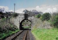 <h4><a href='/locations/I/Inglis_Mill'>Inglis Mill</a></h4><p><small><a href='/companies/B/Balerno_Branch_Caledonian_Railway'>Balerno Branch (Caledonian Railway)</a></small></p><p>The bridge carrying the approach road to Inglis Mill seen in a view looking east. 53/81</p><p>//<br><small><a href='/contributors/Don_Shaw'>Don Shaw</a></small></p>