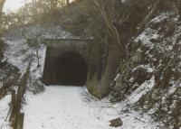 <h4><a href='/locations/C/Colinton_Tunnel'>Colinton Tunnel</a></h4><p><small><a href='/companies/B/Balerno_Branch_Caledonian_Railway'>Balerno Branch (Caledonian Railway)</a></small></p><p>This photograph was taken in 1980s, when walking the old Balerno branch was not as popular an activity as now and you hardly met a soul.  Now, of course, the Colinton tunnel has changed all that! This is the east portal of the tunnel in 1985. 72/81</p><p>//1985<br><small><a href='/contributors/Don_Shaw'>Don Shaw</a></small></p>