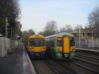 <h4><a href='/locations/S/Sydenham'>Sydenham</a></h4><p><small><a href='/companies/L/London_and_Croydon_Railway'>London and Croydon Railway</a></small></p><p>378148 with a London Overground service from Crystal Palace to Highbury & Islington departing from its first stop at Sydenham with 377323 overtaking on a fast Southern service to London Bridge, both heading away from the camera,  on the afternoon of 29th November 2021. Stopping Southern services also call here but the station has been operated by TfL since 23rd May 2010 when Overground trains first started calling. 52/58</p><p>29/11/2021<br><small><a href='/contributors/David_Bosher'>David Bosher</a></small></p>