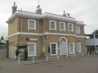 <h4><a href='/locations/E/Erith'>Erith</a></h4><p><small><a href='/companies/N/North_Kent_Railway'>North Kent Railway</a></small></p><p>Exterior of Erith, south-east London, one of the original North Kent Railway stations opened with the line on 30th July 1849, seen on 2nd March 2013. The main building is no longer in railway use, intending passengers purchasing tickets from a machine and entering through a gap on the left. 17/189</p><p>02/03/2013<br><small><a href='/contributors/David_Bosher'>David Bosher</a></small></p>