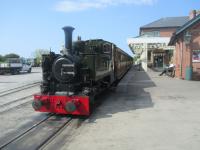 <h4><a href='/locations/T/Tywyn_Wharf'>Tywyn Wharf</a></h4><p><small><a href='/companies/T/Talyllyn_Railway'>Talyllyn Railway</a></small></p><p>Having run round its train, 0-4-2T No.7 'Tom Rolt' is now ready to depart from Tywyn Wharf station with a Talyllyn Railway train to Nant Gwernol, on 24th May 2016. No.7 was rebuilt at the railway's Pendre Works in 1991 from an 0-4-0WT locomotive and named after the founder of the Talyllyn Railway Society. Without him we may never have had all the heritage lines the UK now enjoys.  29/75</p><p>24/05/2016<br><small><a href='/contributors/David_Bosher'>David Bosher</a></small></p>