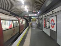 <h4><a href='/locations/O/Old_Street_CSLR'>Old Street [CSLR]</a></h4><p><small><a href='/companies/C/City_and_South_London_Railway'>City and South London Railway</a></small></p><p>LU 1995 stock with a Northern Line service to Morden departing from Old Street on 14th January 2022. This was the last day, for five months, of through trains to Morden via the Bank branch with its temporary closure between Moorgate and Kennington for reconstruction of the platforms at Bank station.  77/87</p><p>14/01/2022<br><small><a href='/contributors/David_Bosher'>David Bosher</a></small></p>