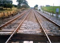 A short section of the West Coast Mainline belonged to the North British. Looking south from Heatherbell Level Crossing to Gartsherrie East Junction.<br><br>[Ewan Crawford //1987]