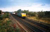 Southbound freight at Garnqueen North Junction.<br><br>[Ewan Crawford //1987]