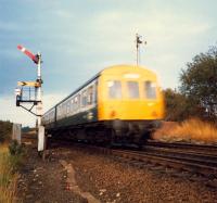 Springburn-Cumbernauld DMU passing Garnqueen North Junction. Access by kind permission of British Rail.<br><br>[Ewan Crawford //1987]